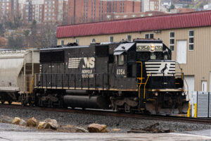 Man hospitalized after being struck by train